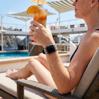 Aqua festive watchband beside a cruise pool