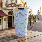 Blue Autographs tumbler outside a Victorian clockmaker storefront