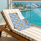 Blue Checkerboard Donald blanket on a cruise balcony lounge chair