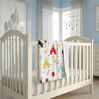 Castle Celebration blanket in a sky-blue nursery