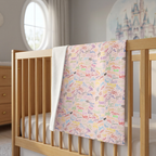Character Autographs on Pink blanket in a dove-gray nursery