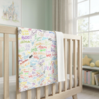 Character Autographs on White blanket in a mint nursery