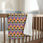 Checkerboard Mickey Hands blanket in a blue-and-ivory nursery
