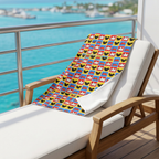 Checkerboard Mickey Hands blanket on a cruise balcony lounge chair