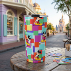 Colorblock Mickey tumbler outside a lavender Victorian cafe