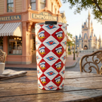DCL Donald tumbler outside a peach Victorian cafe