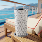 Epcot tumbler on a cruise lounger overlooking a mountainous coast