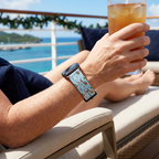 Festive watchband on a sunny cruise deck