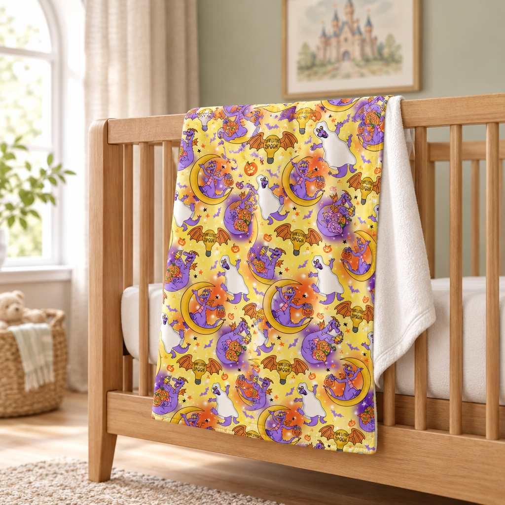 Figment yellow blanket in a sage nursery with an oak crib