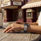 Film-strip watchband at a retro cinema café