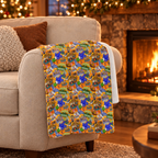 Four Parks Ride Collage blanket on a fireside armchair