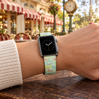 Green autograph watchband at a vintage railway café
