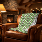 Green Checkerboard Goofy blanket on a cognac leather fireside chair