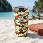 Jungle Camo Mickey tumbler beside a terracotta towel at a jungle-framed cove