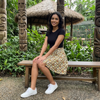 Jungle camo skirt seated near tropical bird pavilion