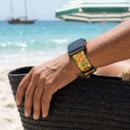 Orange bird-pattern watchband at a tropical beach