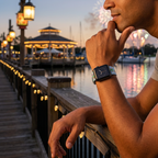 Pale blue festive watchband with waterfront lights and fireworks
