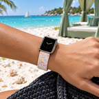 Pink autograph watchband at a tropical beach