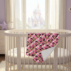 Pink Checkerboard Minnie blanket in a lavender nursery