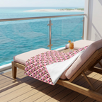Pink Checkerboard Minnie blanket on a cruise balcony lounge chair