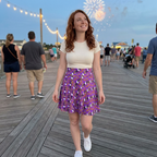 Purple Figment skirt on evening boardwalk