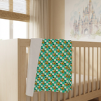 Teal Checkerboard Pluto blanket in a warm neutral nursery